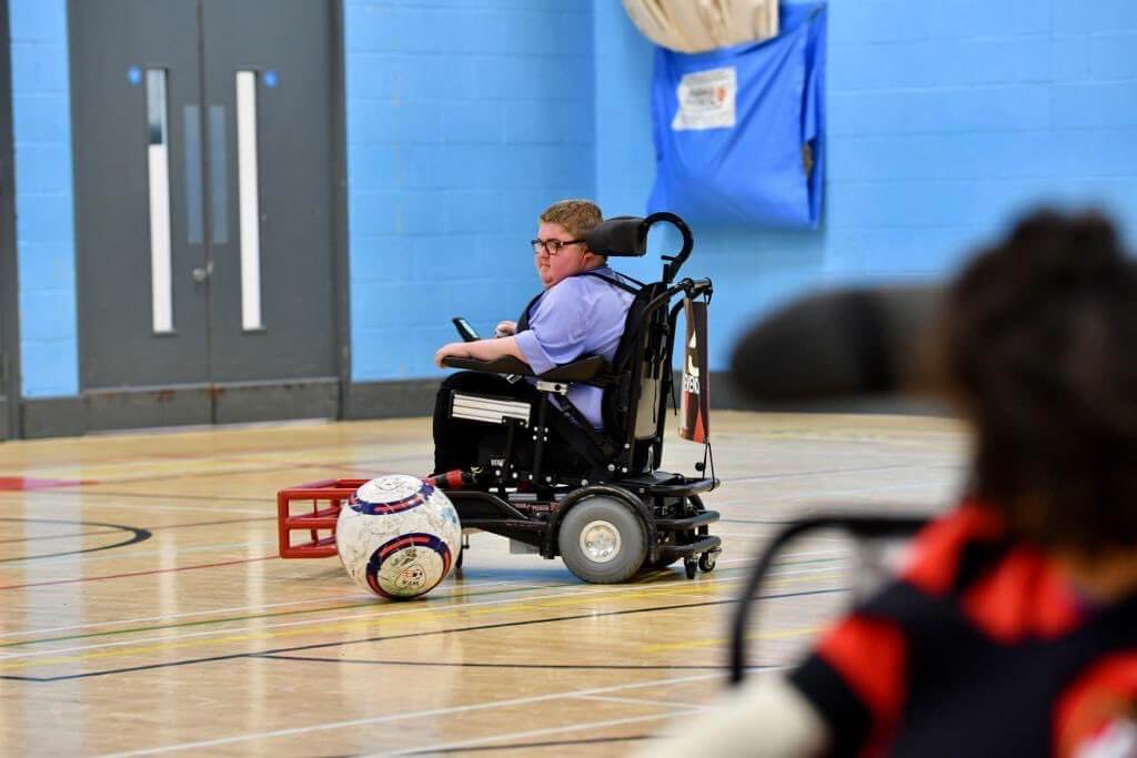 Adam plays Powerchair Football